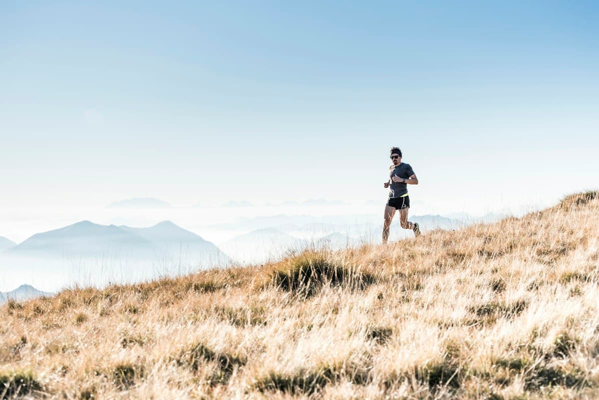 Runner training on a mountain trail
